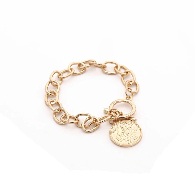 14K Gold Coin Bracelet. Made with eight 19th and early 20th century French  20 Francs and one cast heart pendant (83.80 g). Coins average VF. |  Classical Numismatic Group